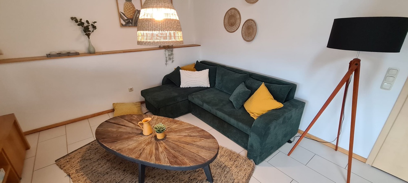 Wohnzimmer der UrbanStay Rottendorf